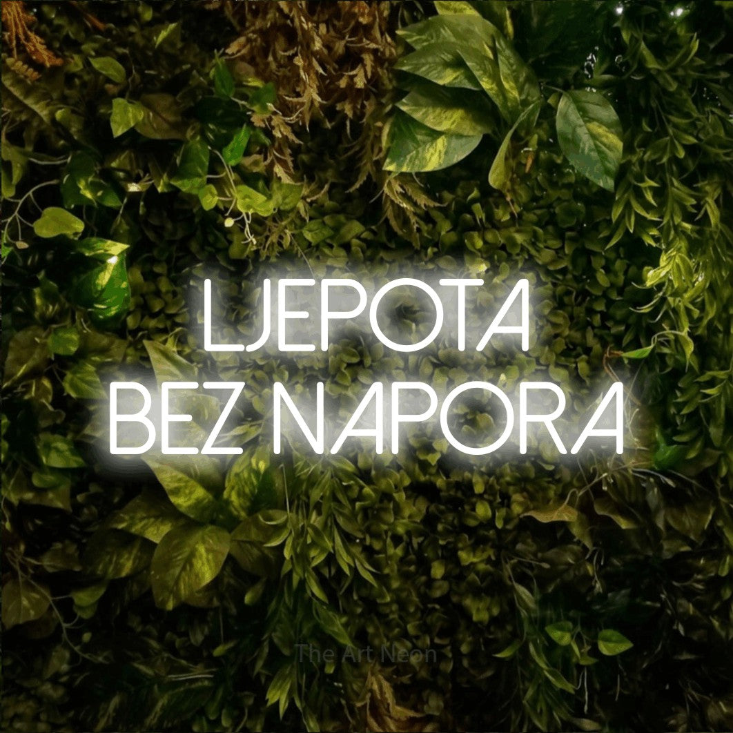 LED neon sign reading “ljepota bez napora”, arranged in two lines.