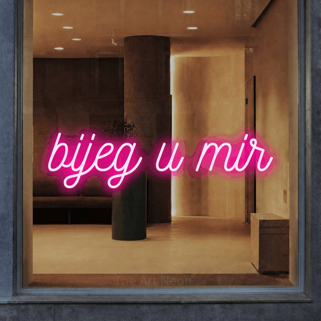 LED neon sign reading “bijeg u mir”, arranged in a single line.