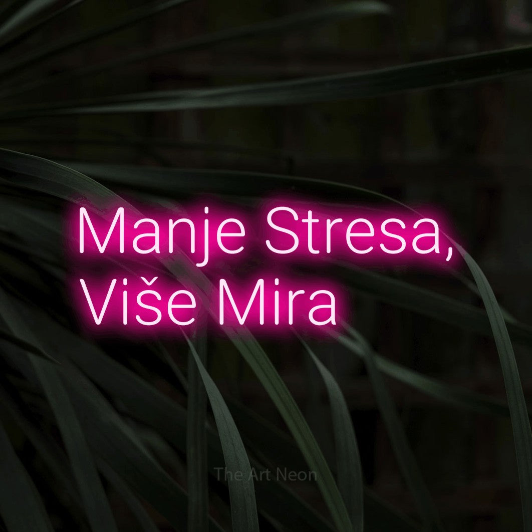 LED neon sign reading “Manje Stresa, Više Mira”, arranged in two lines.