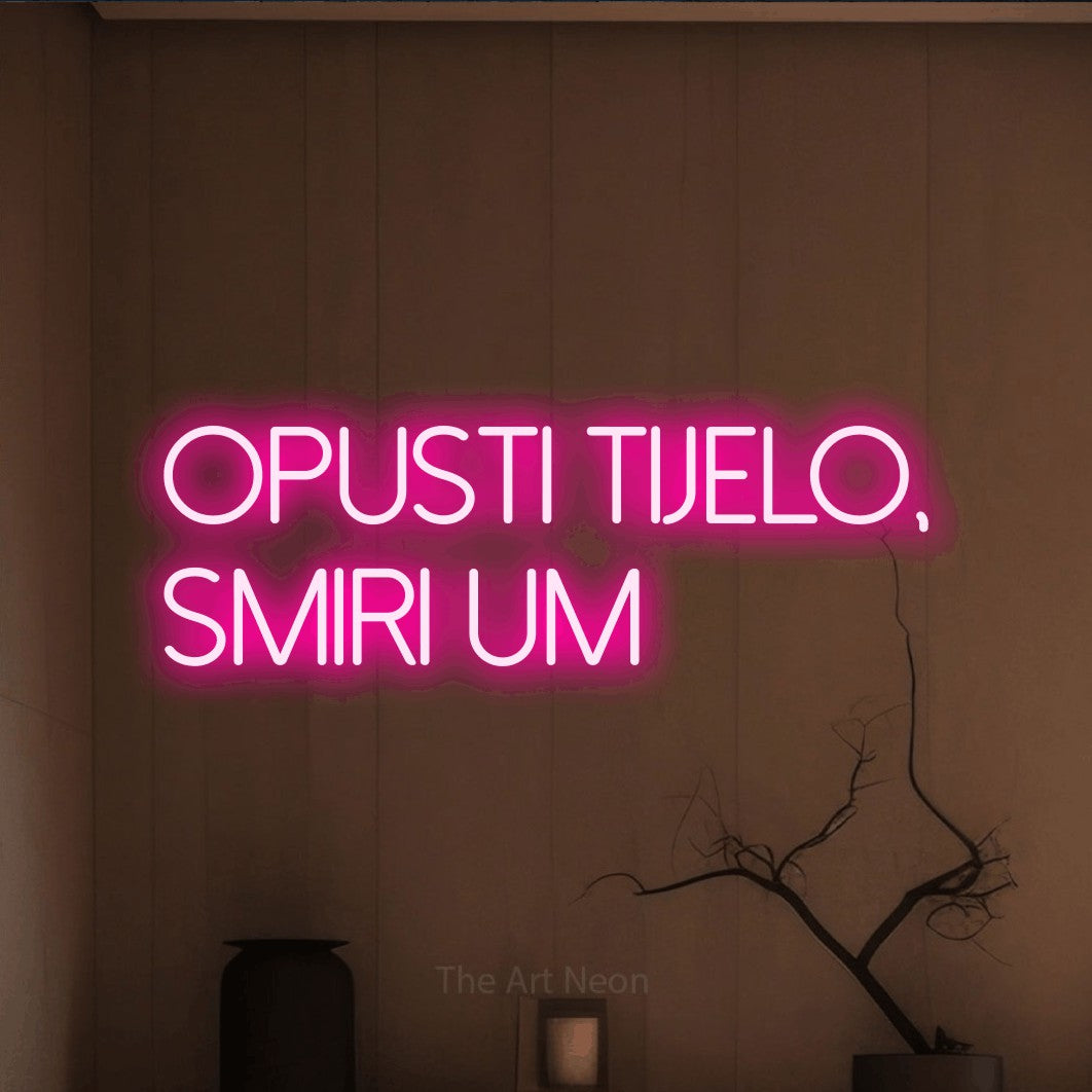 LED neon sign reading “opusti tijelo, smiri um”, arranged in two lines.