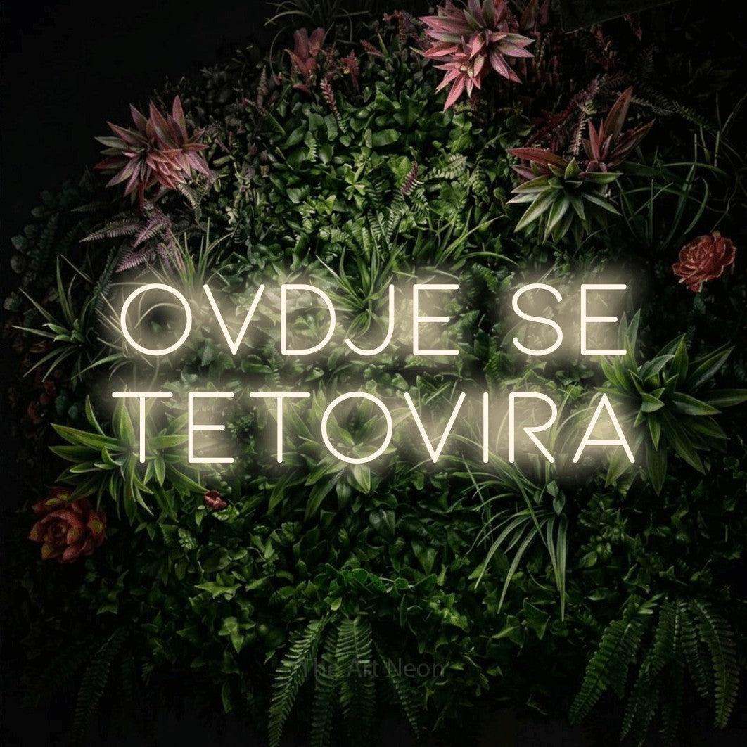 LED neon sign reading “ovdje se tetovira”, arranged in two lines.