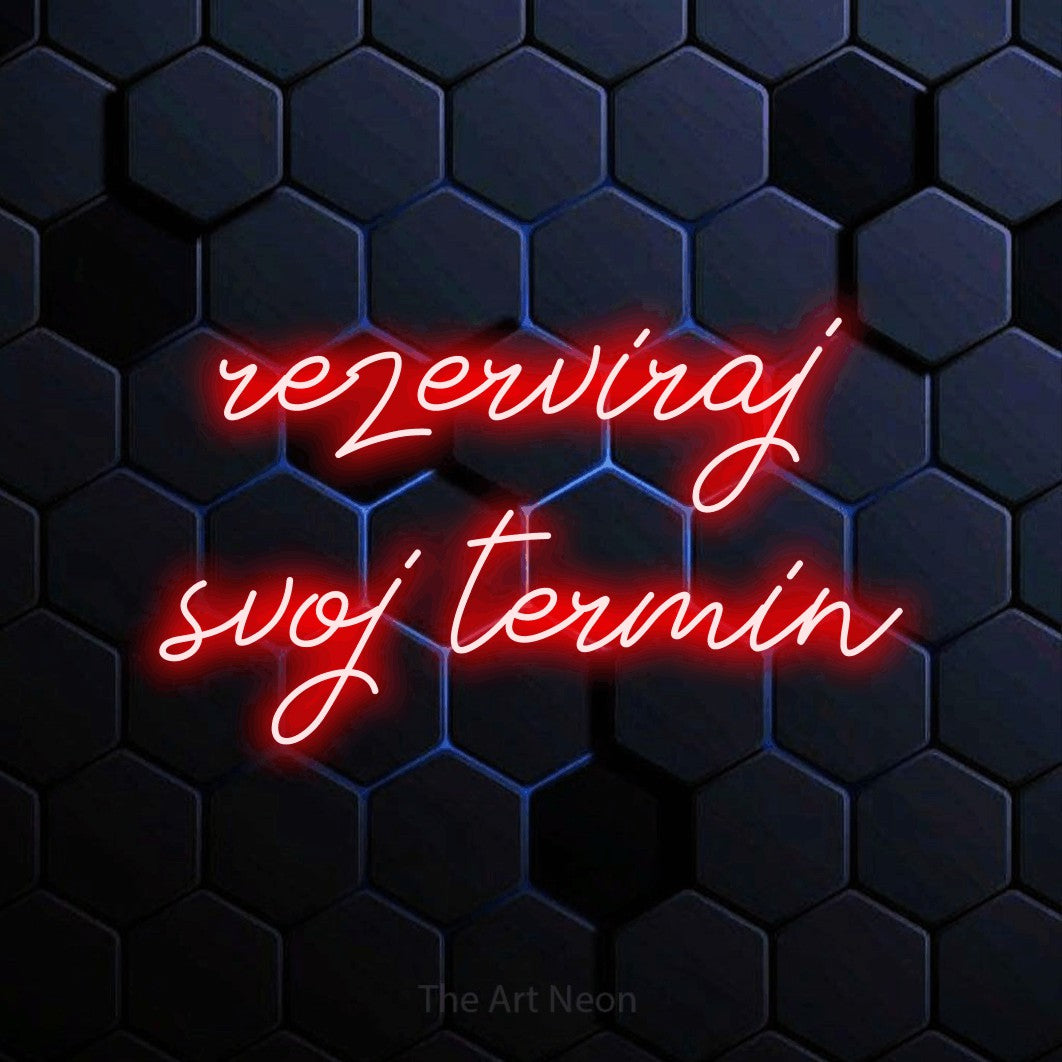 LED neon sign reading “rezerviraj svoj termin”, arranged in two lines.