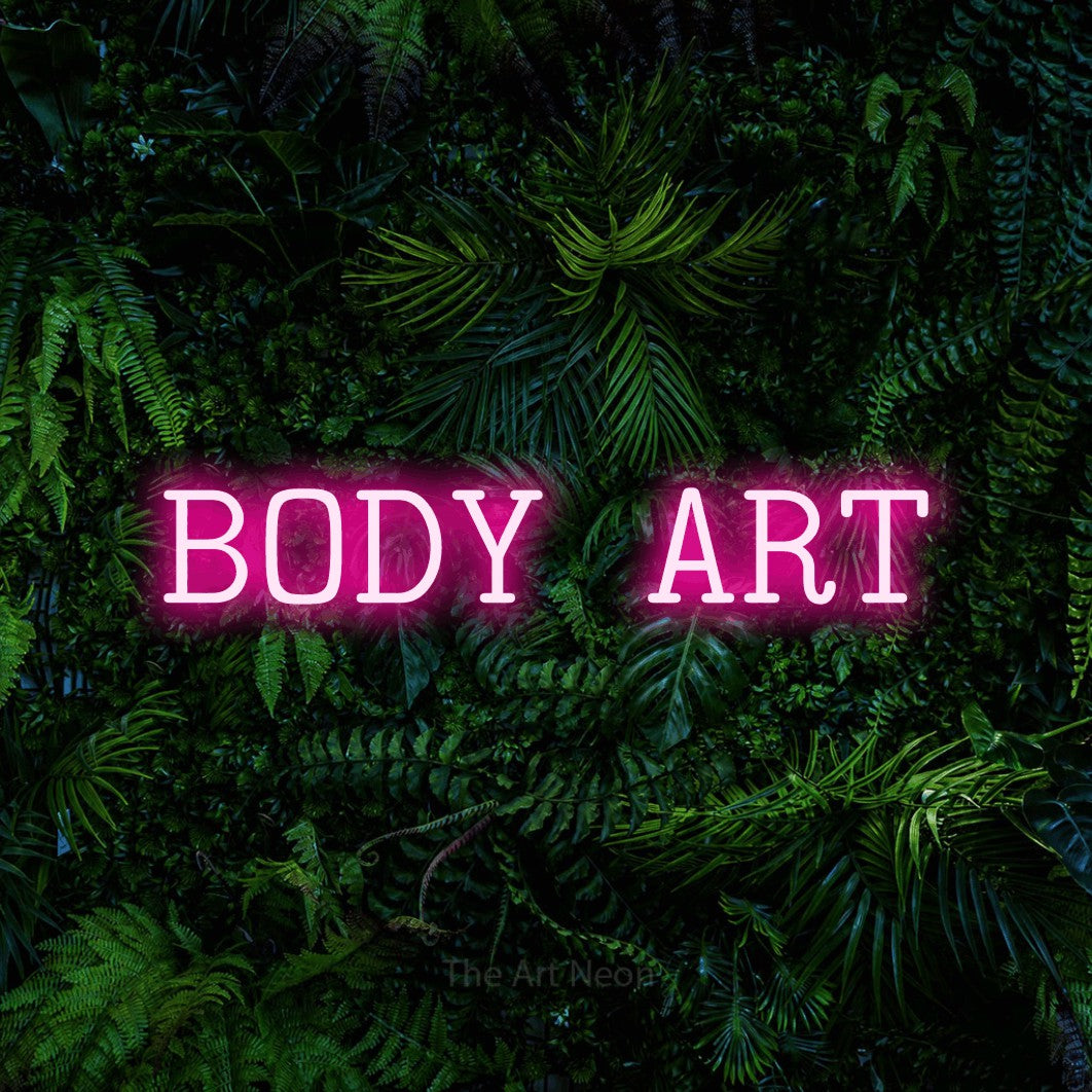 LED neon sign reading “BODY ART”, arranged in a single line.