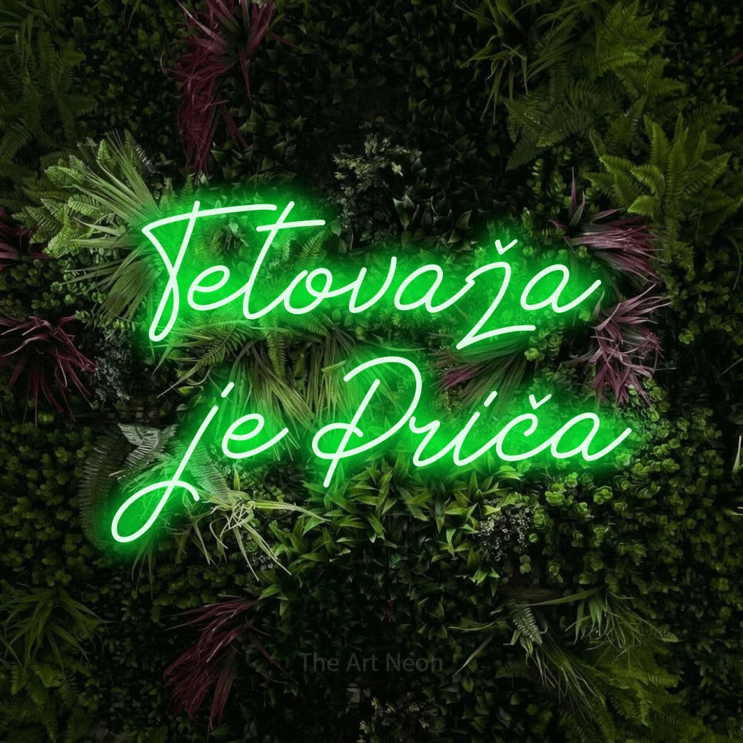 LED neon sign reading “Tetovaža je Priča”, arranged in two lines.