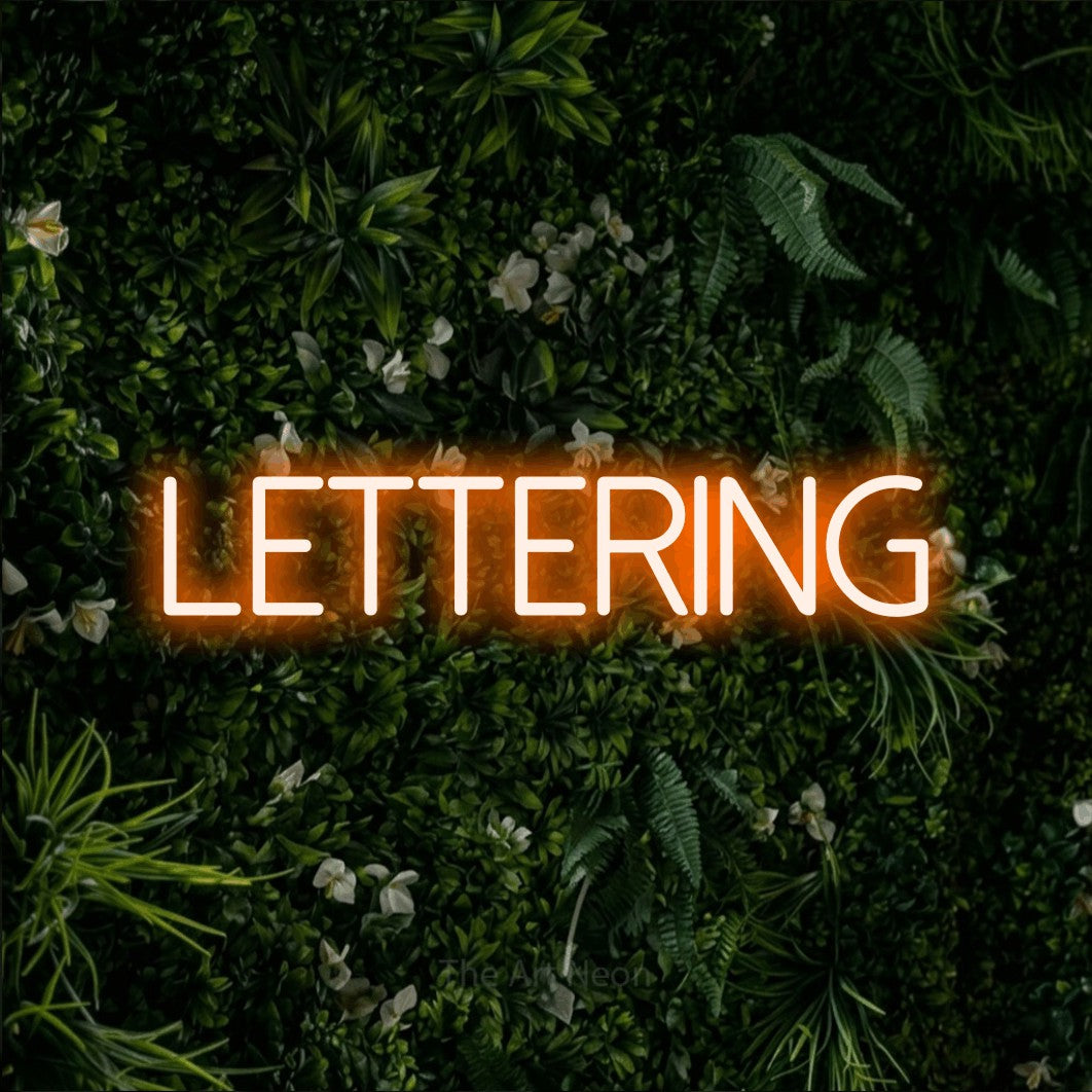 LED neon sign reading “Lettering”, arranged in a single line.