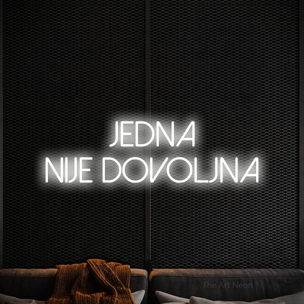 LED neon sign reading “Jedna Nije Dovoljna”, arranged in two lines.