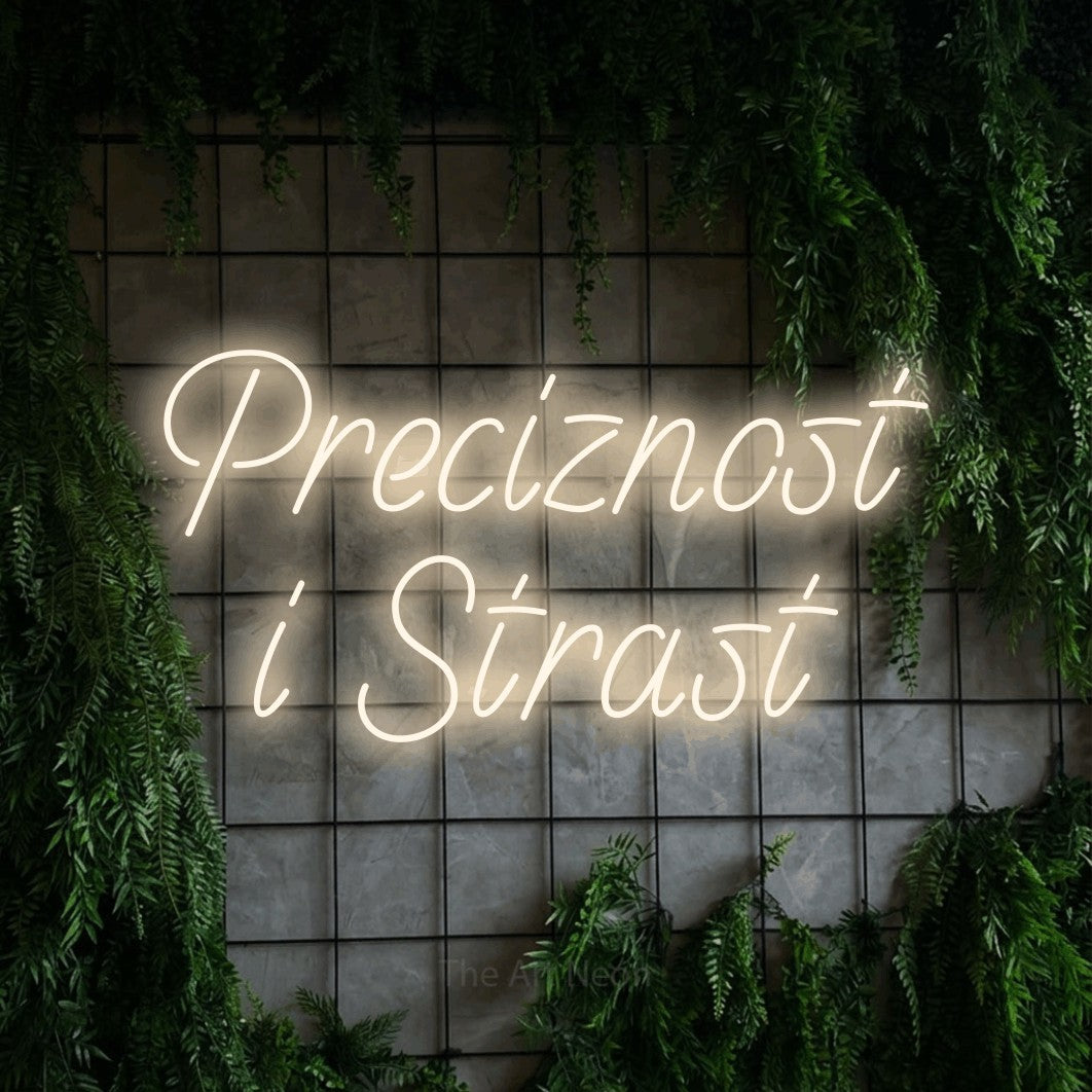 LED neon sign reading “Preciznost i Strast”, arranged in two lines.