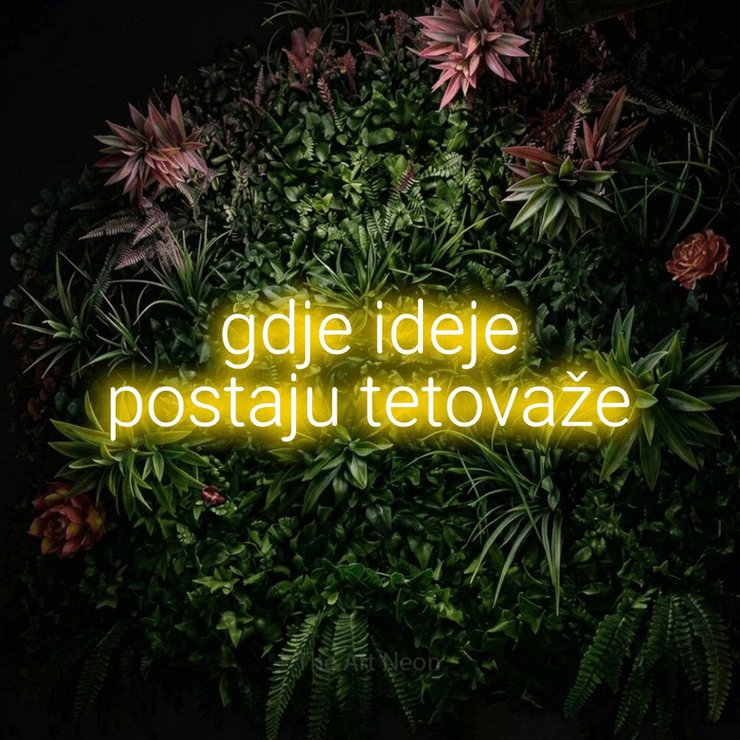 LED neon sign reading “gdje ideje postaju tetovaže”, arranged in two lines.