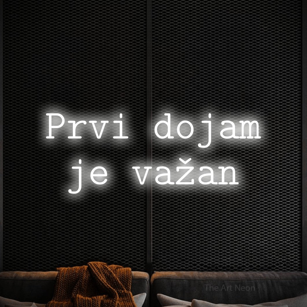 LED neon sign reading “Prvi dojam je važan”, arranged in two lines.