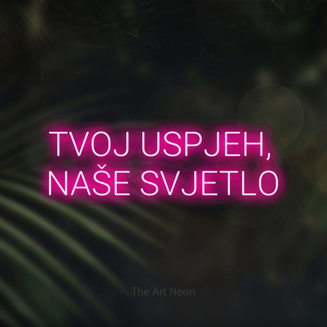 LED neon sign reading “TVOJ USPJEH, NAŠE SVJETLO”, arranged in two lines.