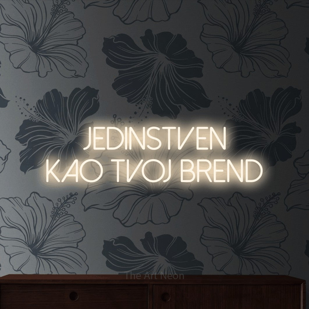 LED neon sign reading “JEDINSTVEN KAO TVOJ BREND”, arranged in two lines.