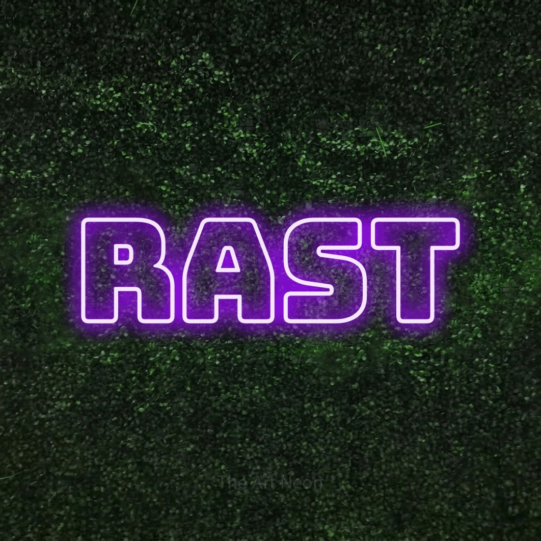 LED neon sign reading “Rast”, arranged in a single line.