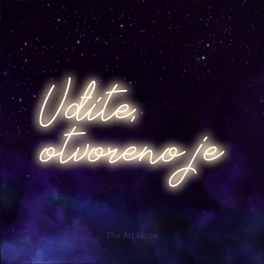 LED neon sign reading “Uđite, otvoreno je”, arranged in two lines.
