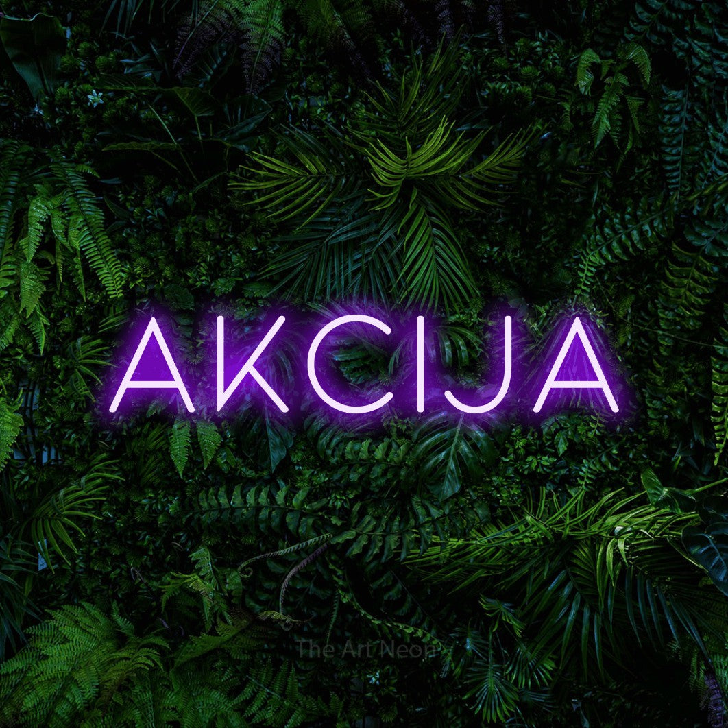 LED neon sign reading “akcija”, arranged in a single line.