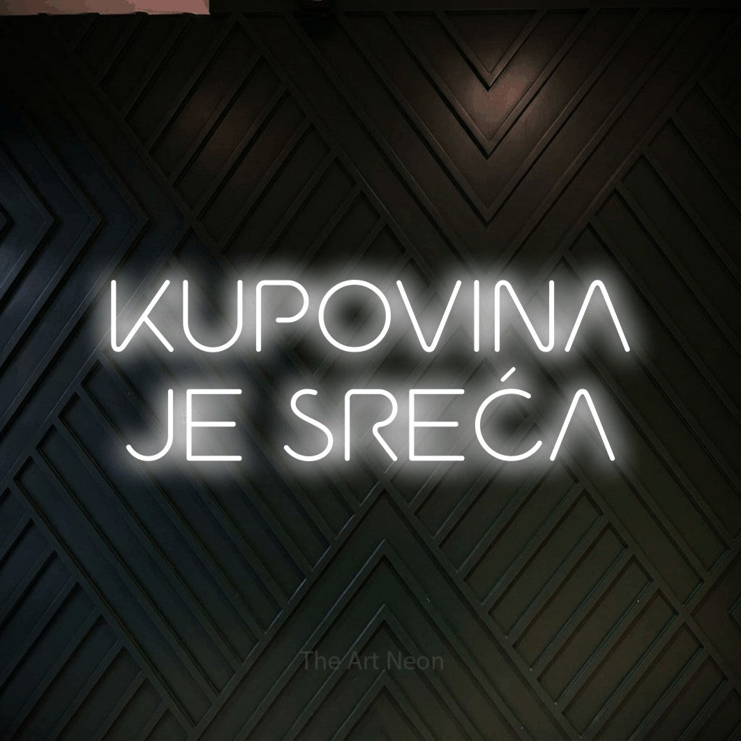 LED neon sign reading “KUPOVINA JE SREĆA”, arranged in two lines.