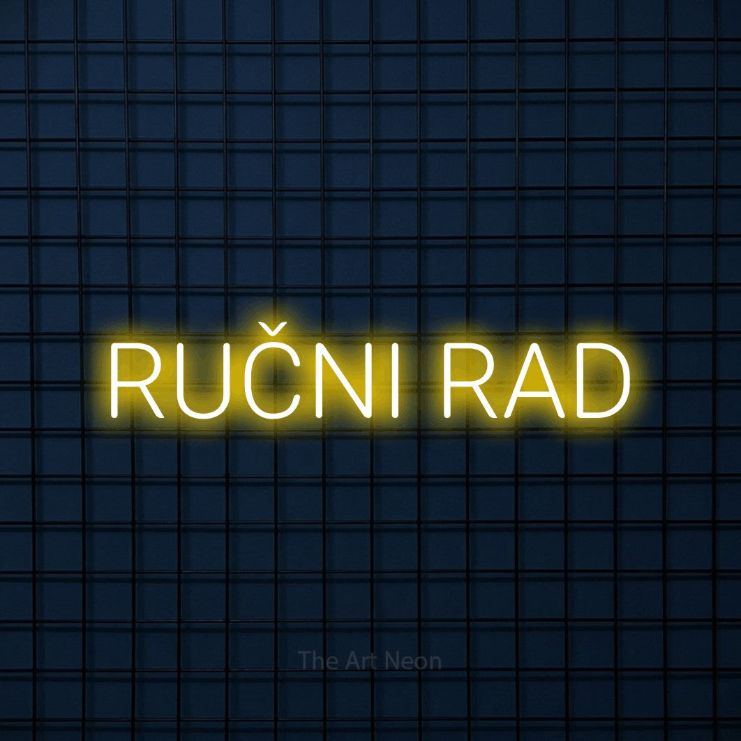 LED neon sign reading “RUČNI RAD”, arranged in a single line.