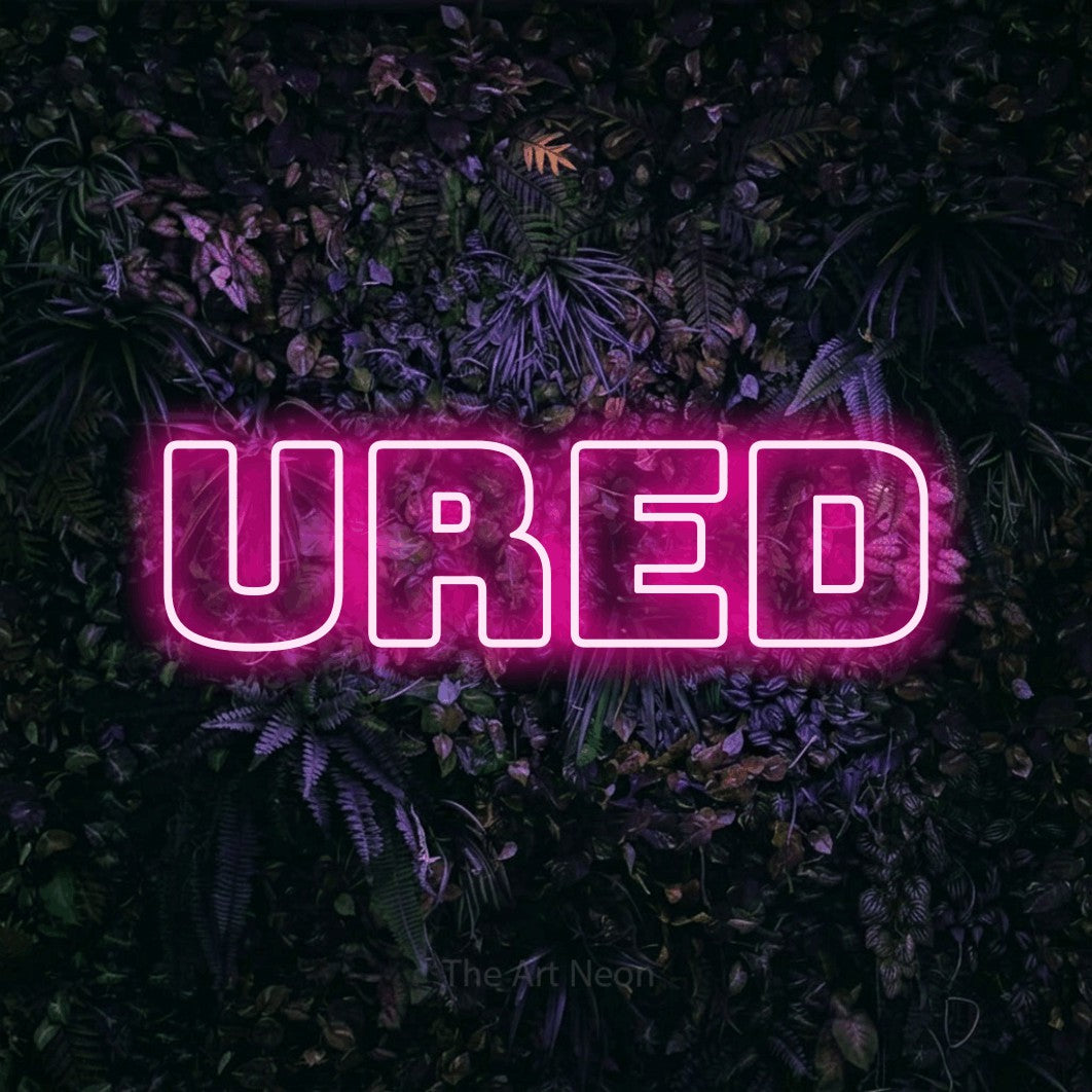 LED neon sign reading “ured”, arranged in a single line.