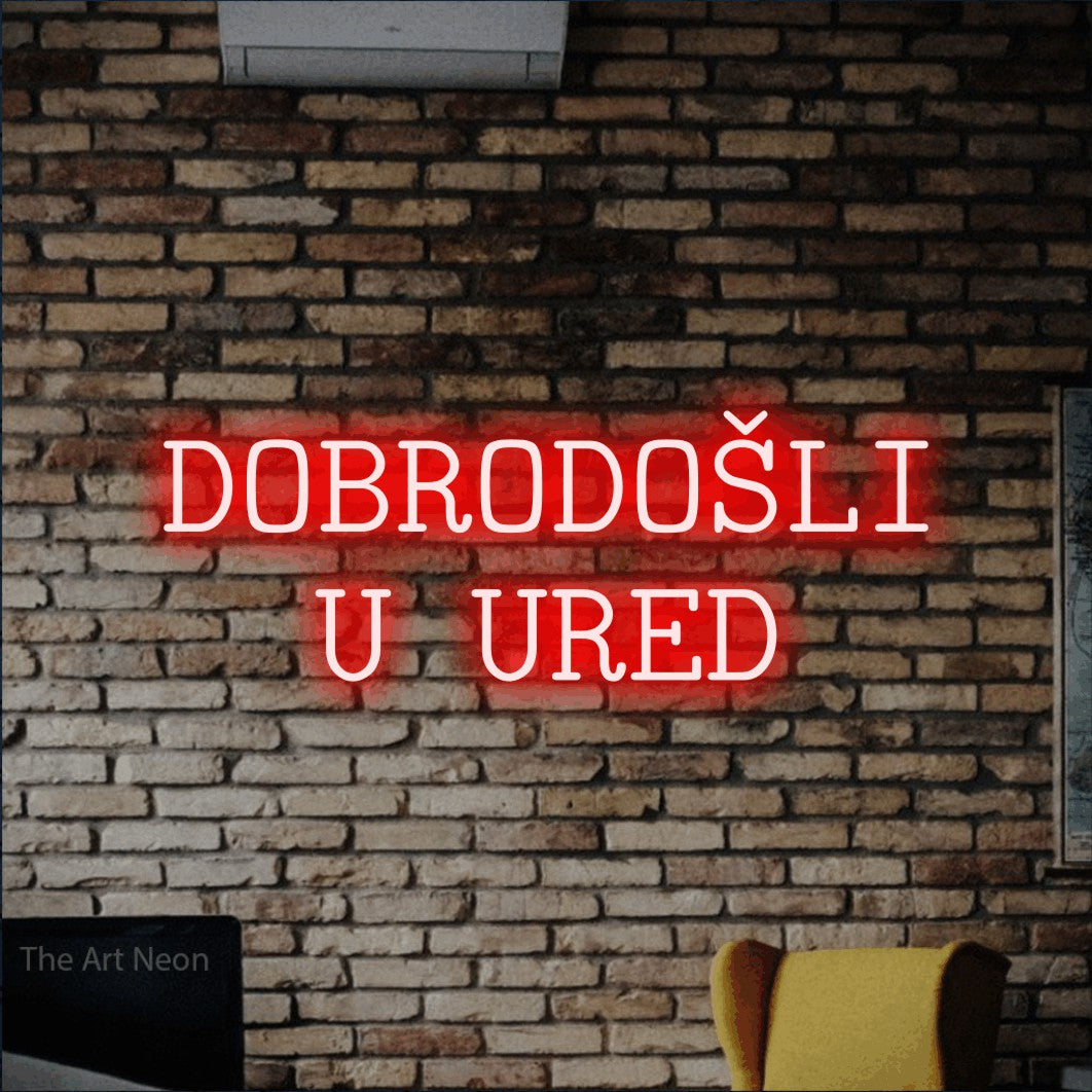 LED neon sign reading “DOBRODOŠLI U URED”, arranged in two lines.