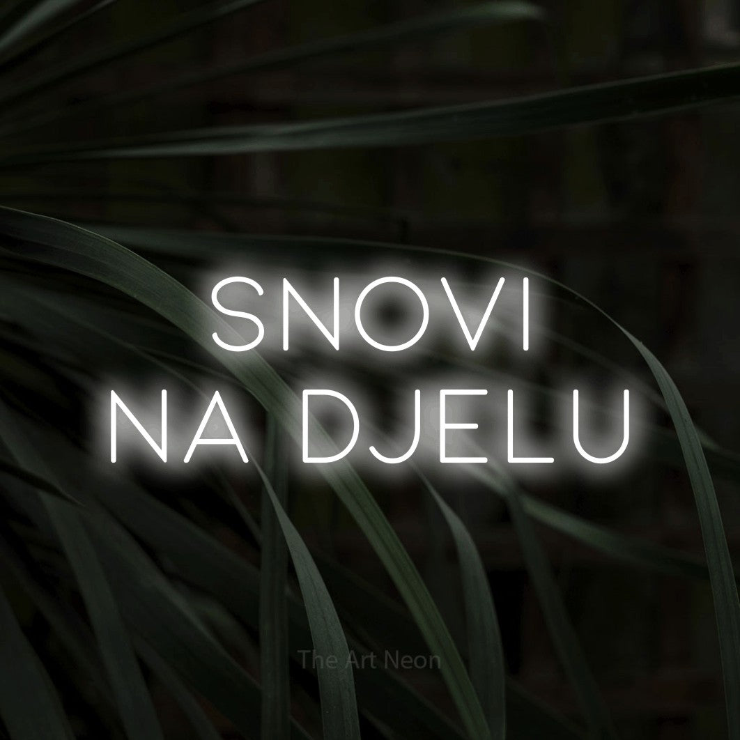 LED neon sign reading “SNOVI NA DJELU”, arranged in two lines.