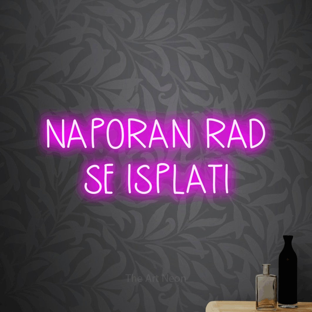 LED neon sign reading “NAPORAN RAD SE ISPLATI”, arranged in two lines.