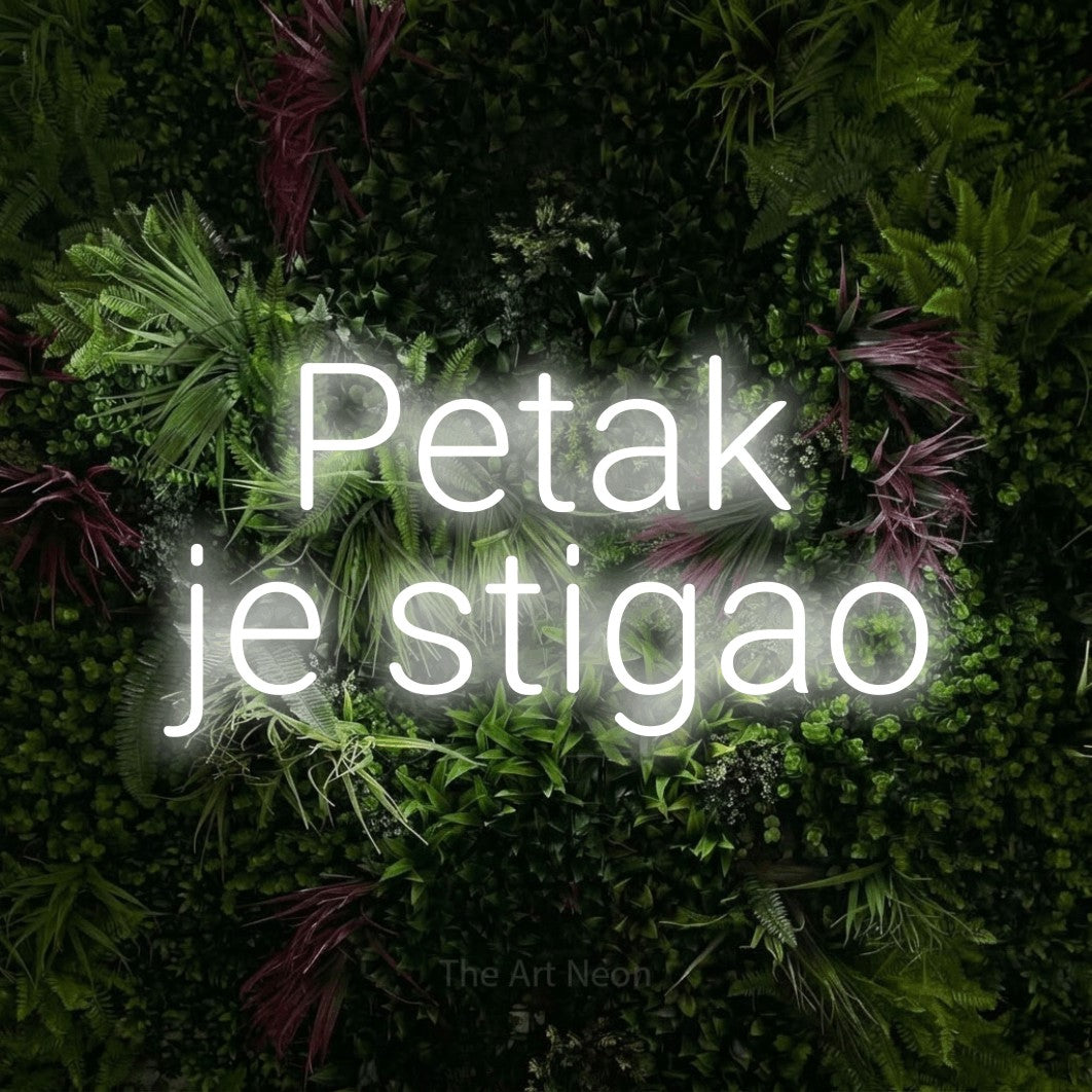 LED neon sign reading “Petak je stigao”, arranged in two lines.