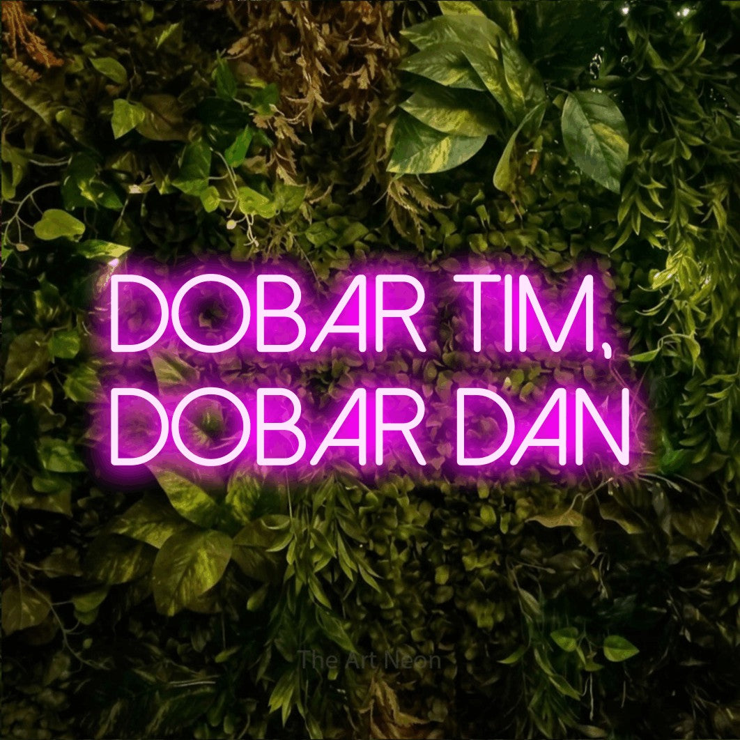 LED neon sign reading “DOBAR TIM, DOBAR DAN”, arranged in two lines.