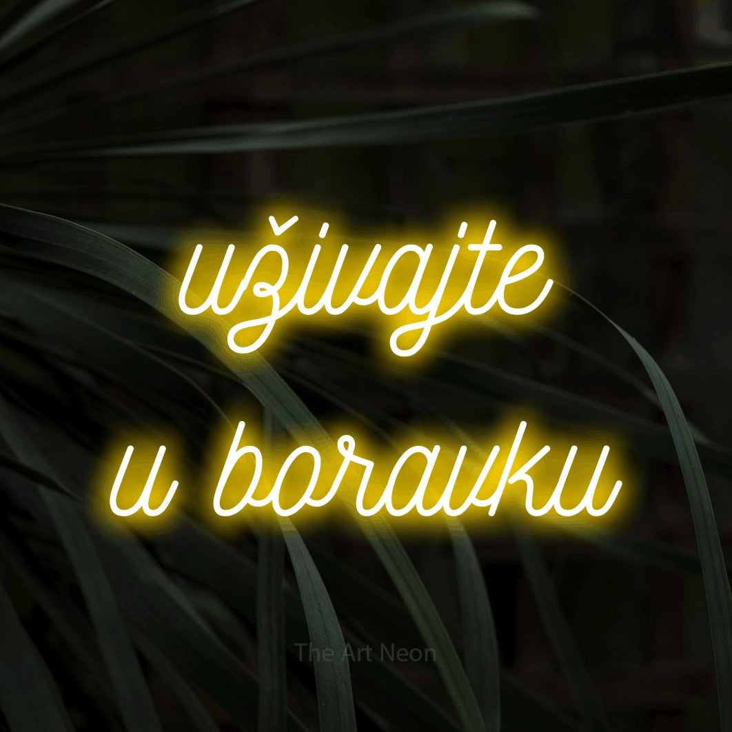 LED neon sign reading “uživajte u boravku”, arranged in two lines.