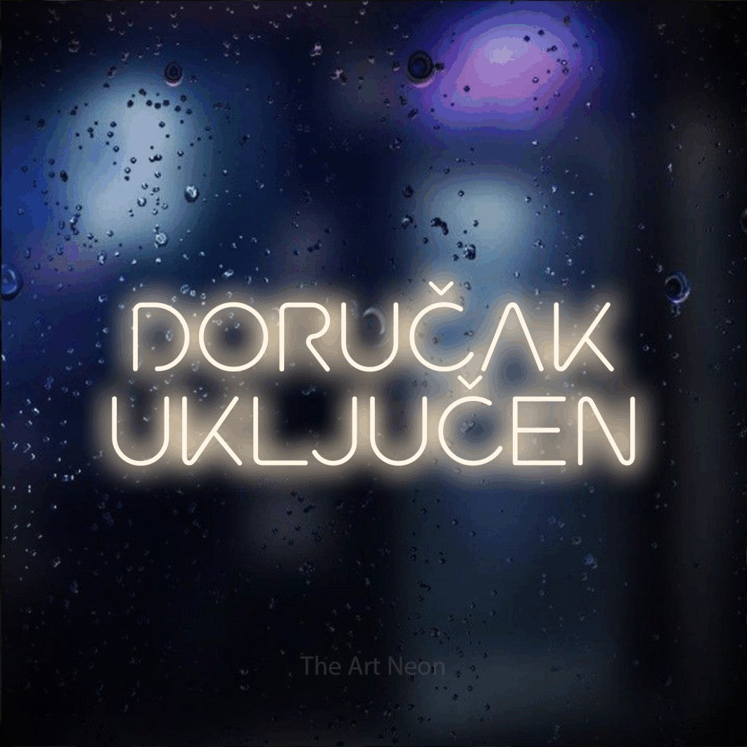 LED neon sign reading “DORUČAK UKLJUČEN”, arranged in two lines.