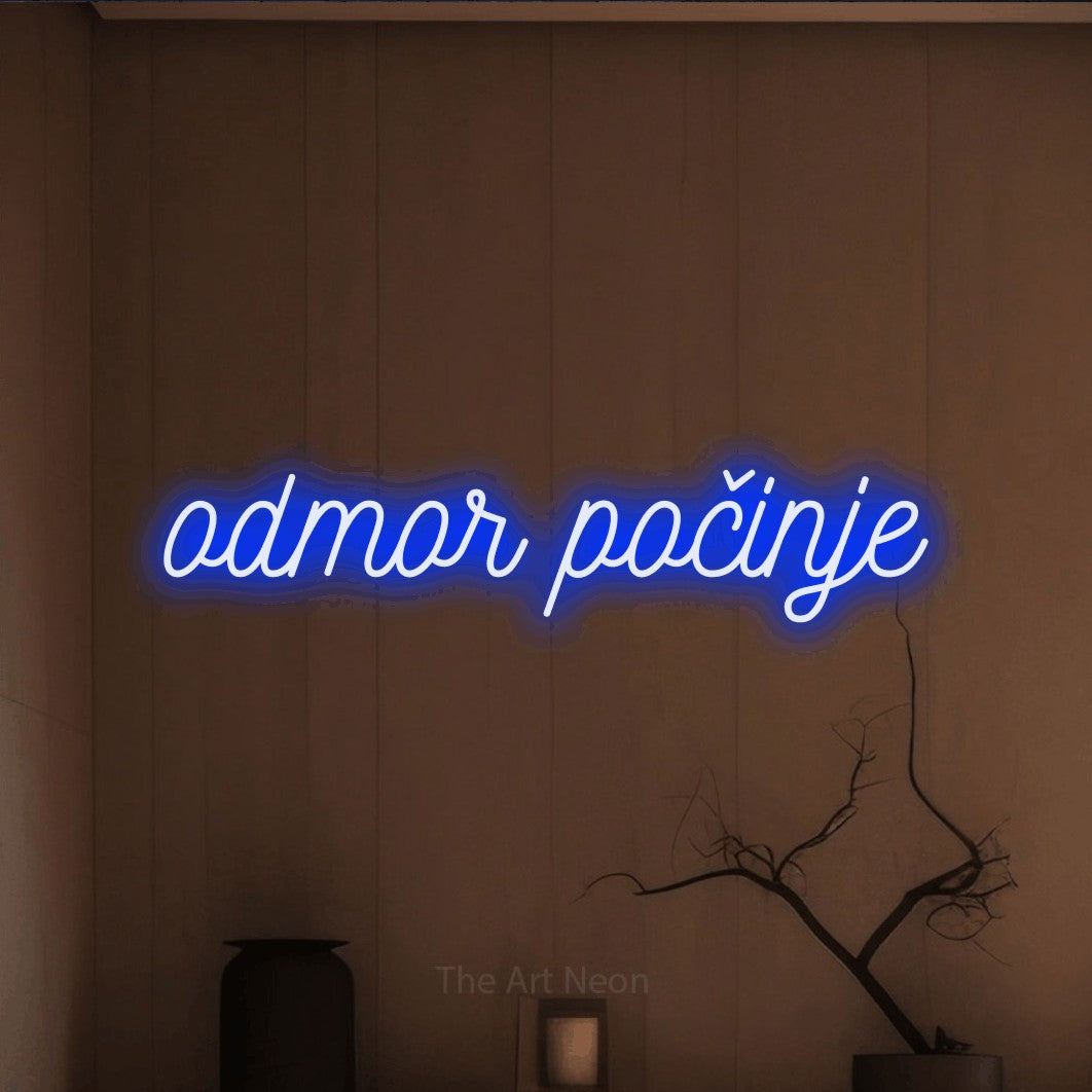 LED neon sign reading “odmor počinje”, arranged in a single line.