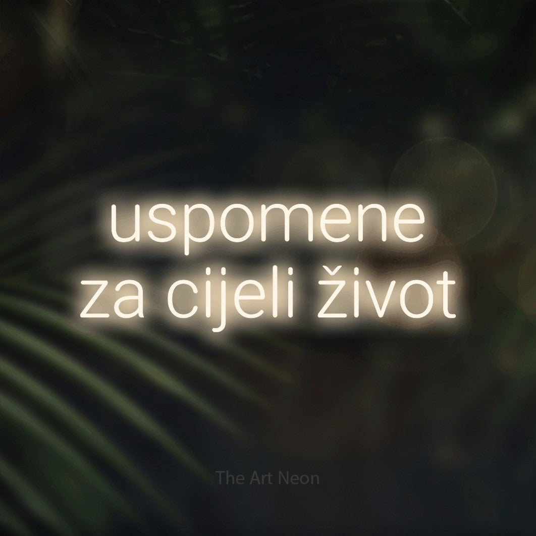 LED neon sign reading “uspomene za cijeli život”, arranged in two lines.