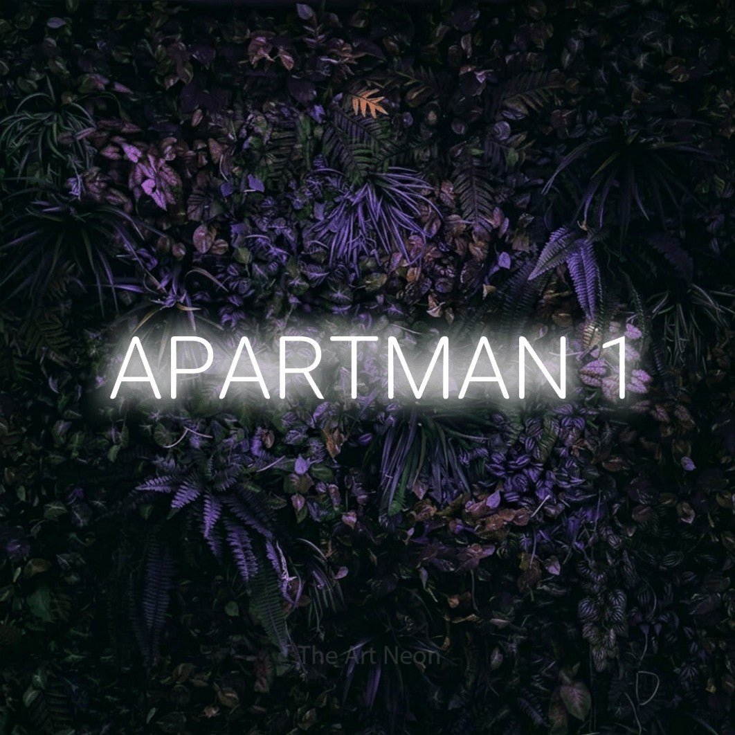 LED neon sign reading “APARTMAN 1”, arranged in a single line.