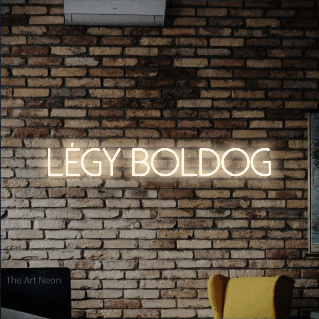 LED neon sign reading “Légy boldog”, arranged in a single line.