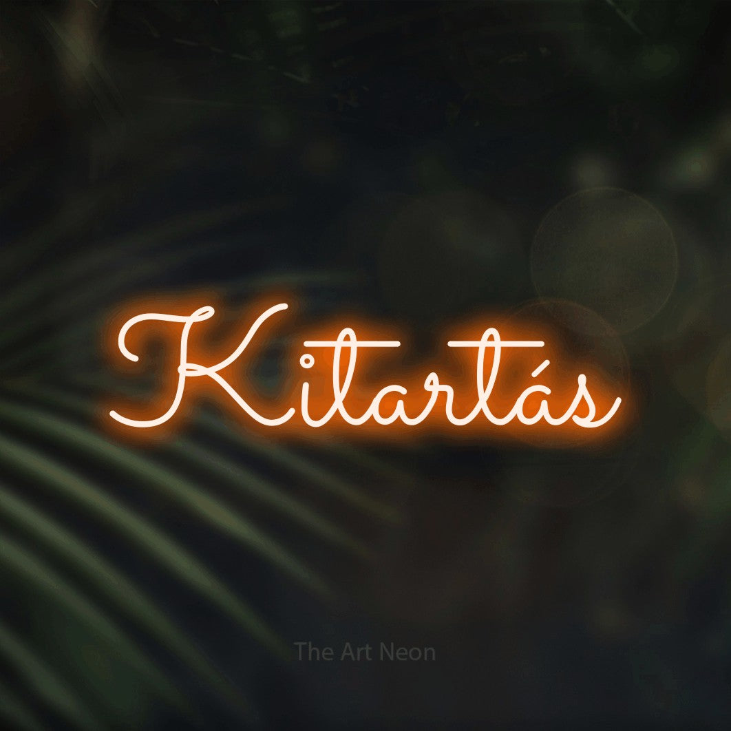 LED neon sign reading “Kitartás”, arranged in a single line.