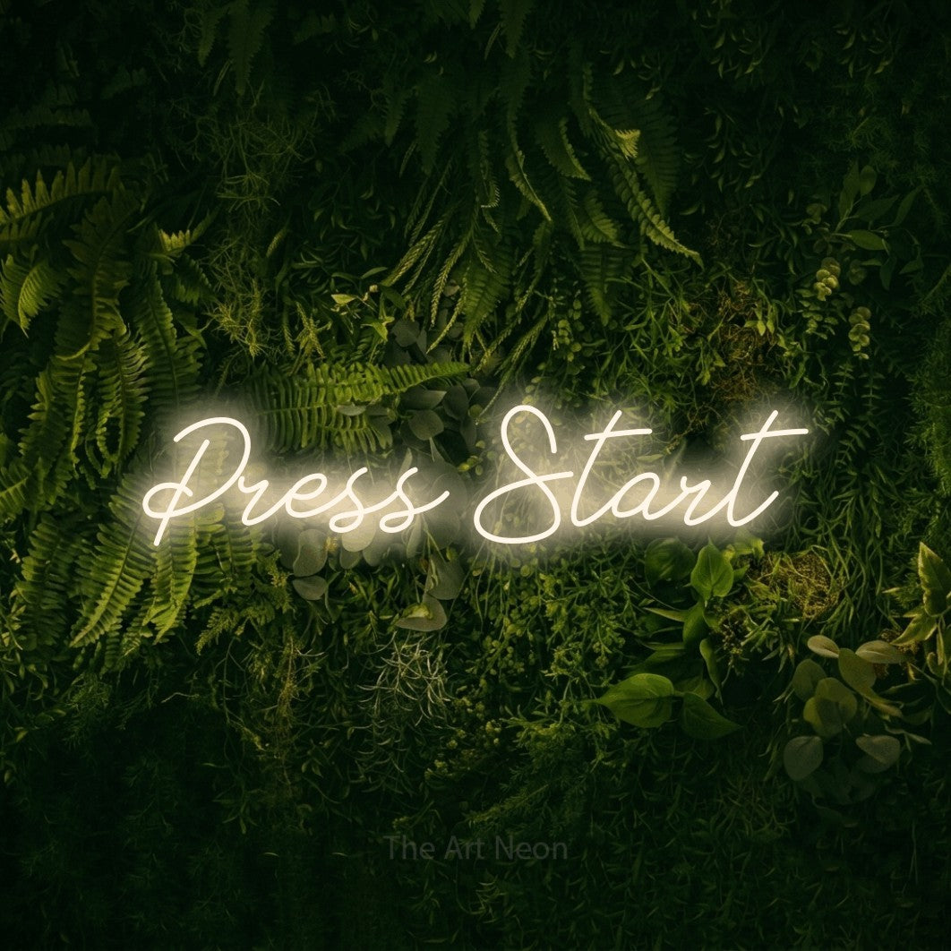 LED neon sign reading “Press Start”, arranged in a single line.