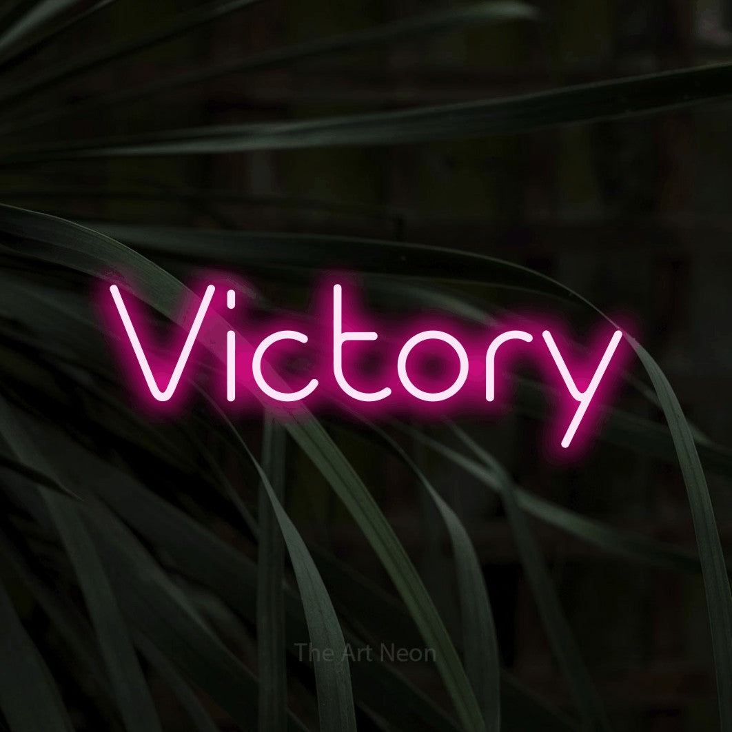 LED neon sign reading “Victory”, arranged in a single line.
