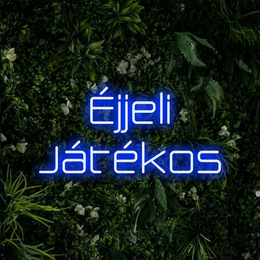 LED neon sign reading “Éjjeli Játékos”, arranged in two lines.