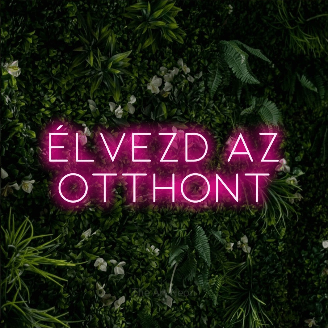 LED neon sign reading “ÉLVEZD AZ OTTHONT”, arranged in two lines.