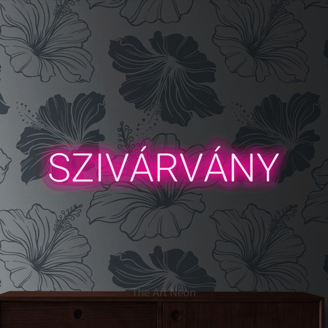 LED neon sign reading “SZIVÁRVÁNY”, arranged in a single line.
