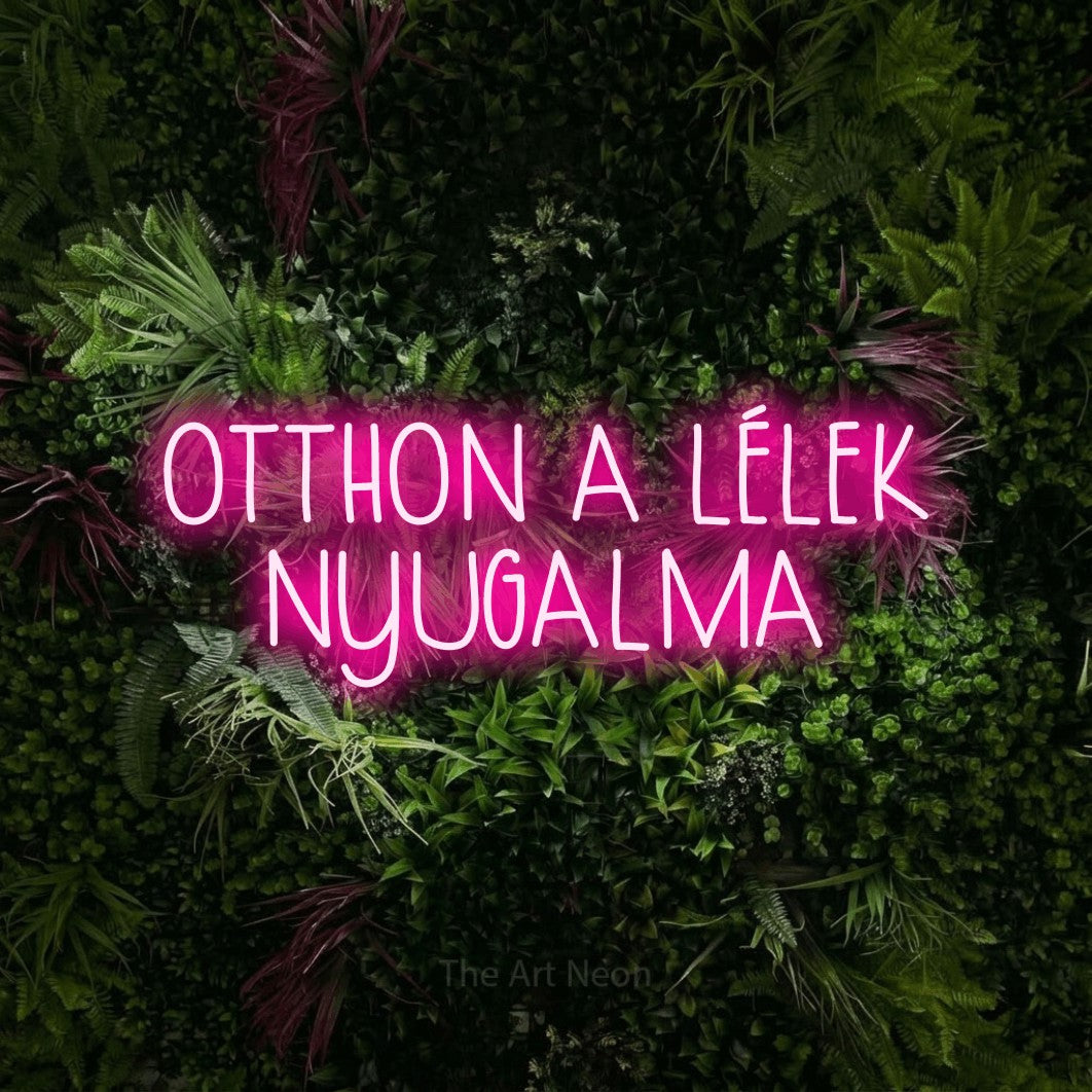 LED neon sign reading “OTTHON A LÉLEK NYUGALMA”, arranged in two lines.
