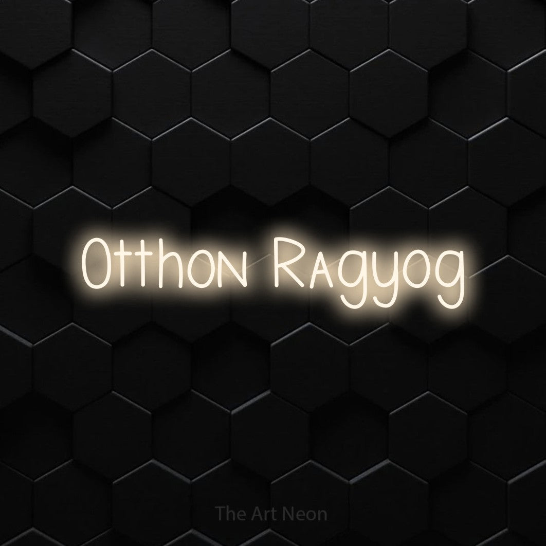 LED neon sign reading “Otthon Ragyog”, arranged in a single line.