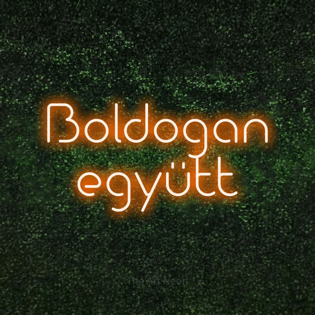 LED neon sign reading “Boldogan együtt”, arranged in two lines.