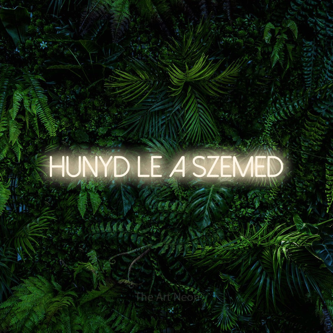 LED neon sign reading “hunyd le a szemed”, arranged in a single line.