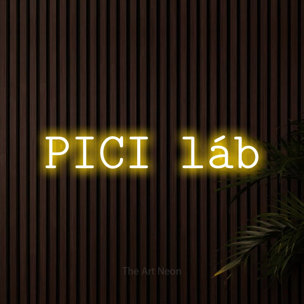 LED neon sign reading “PICI láb”, arranged in a single line.