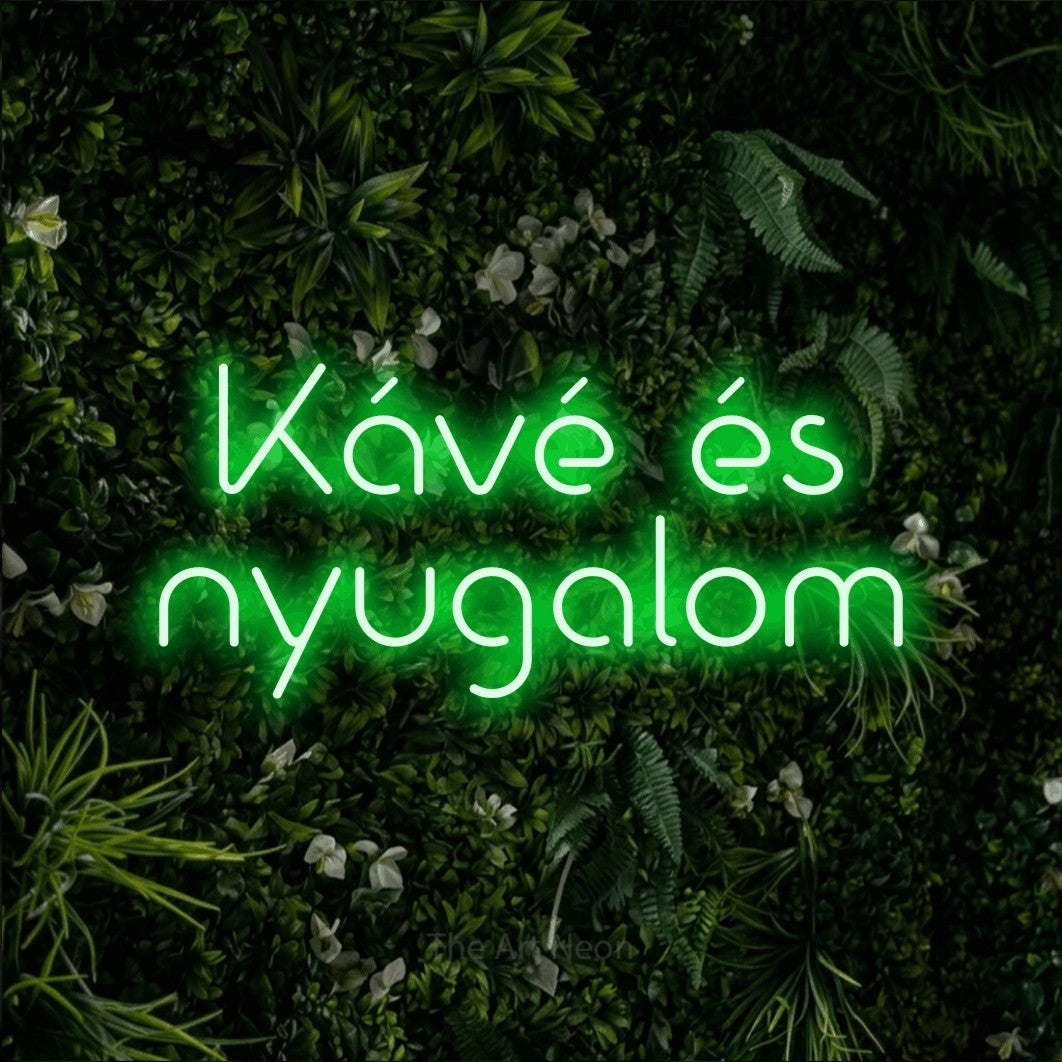 LED neon sign reading “Kávé és nyugalom”, arranged in two lines.