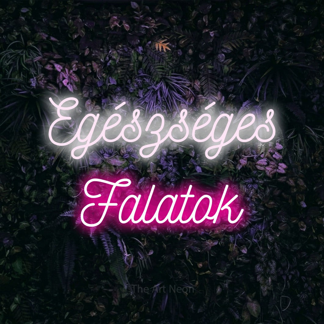 LED neon sign reading “Egészséges Falatok”, arranged in two lines.