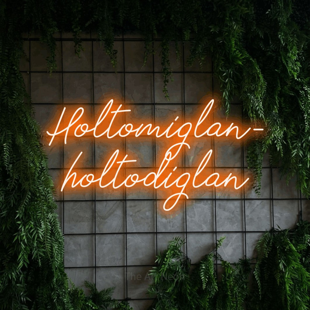 LED neon sign reading “Holtomiglan- holtodiglan”, arranged in two lines.