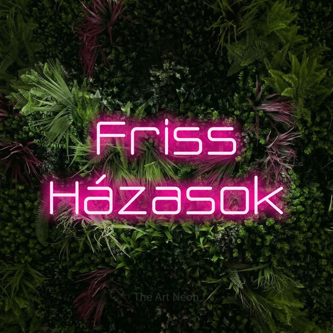 LED neon sign reading “Friss Házasok”, arranged in two lines.