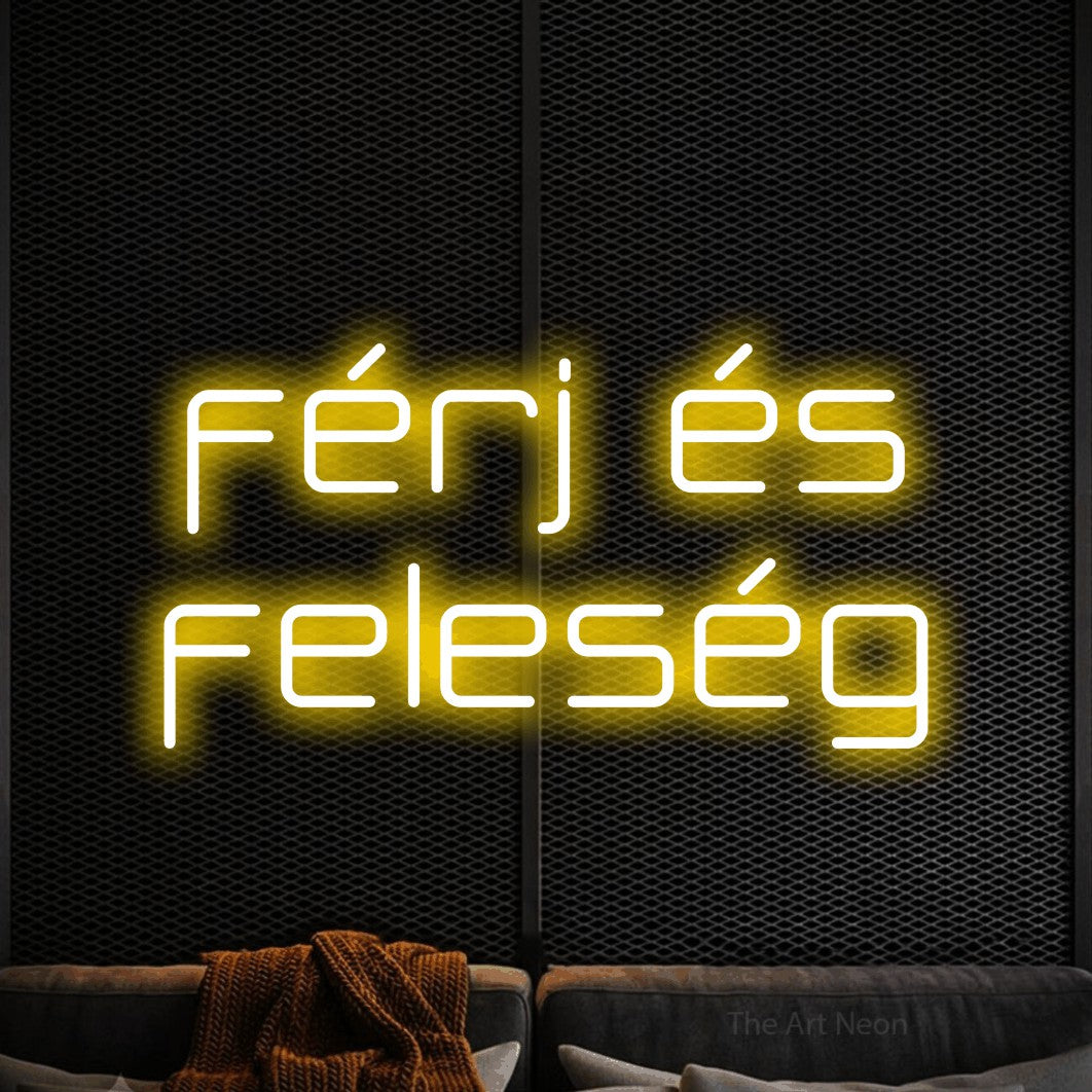 LED neon sign reading “férj és feleség”, arranged in two lines.