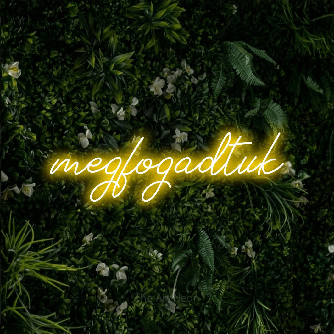 LED neon sign reading “megfogadtuk”, arranged in a single line.