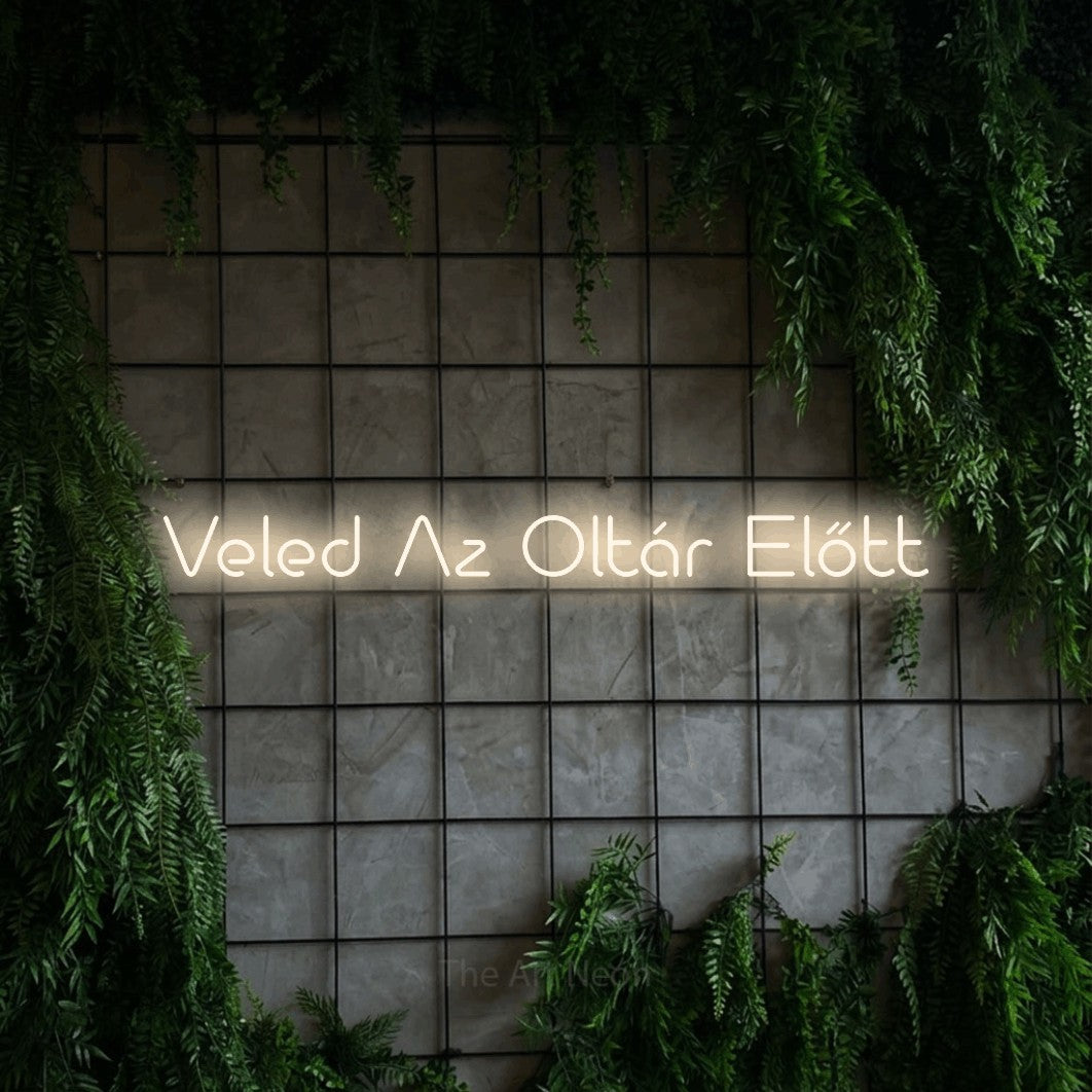 LED neon sign reading “Veled Az Oltár Előtt”, arranged in a single line.